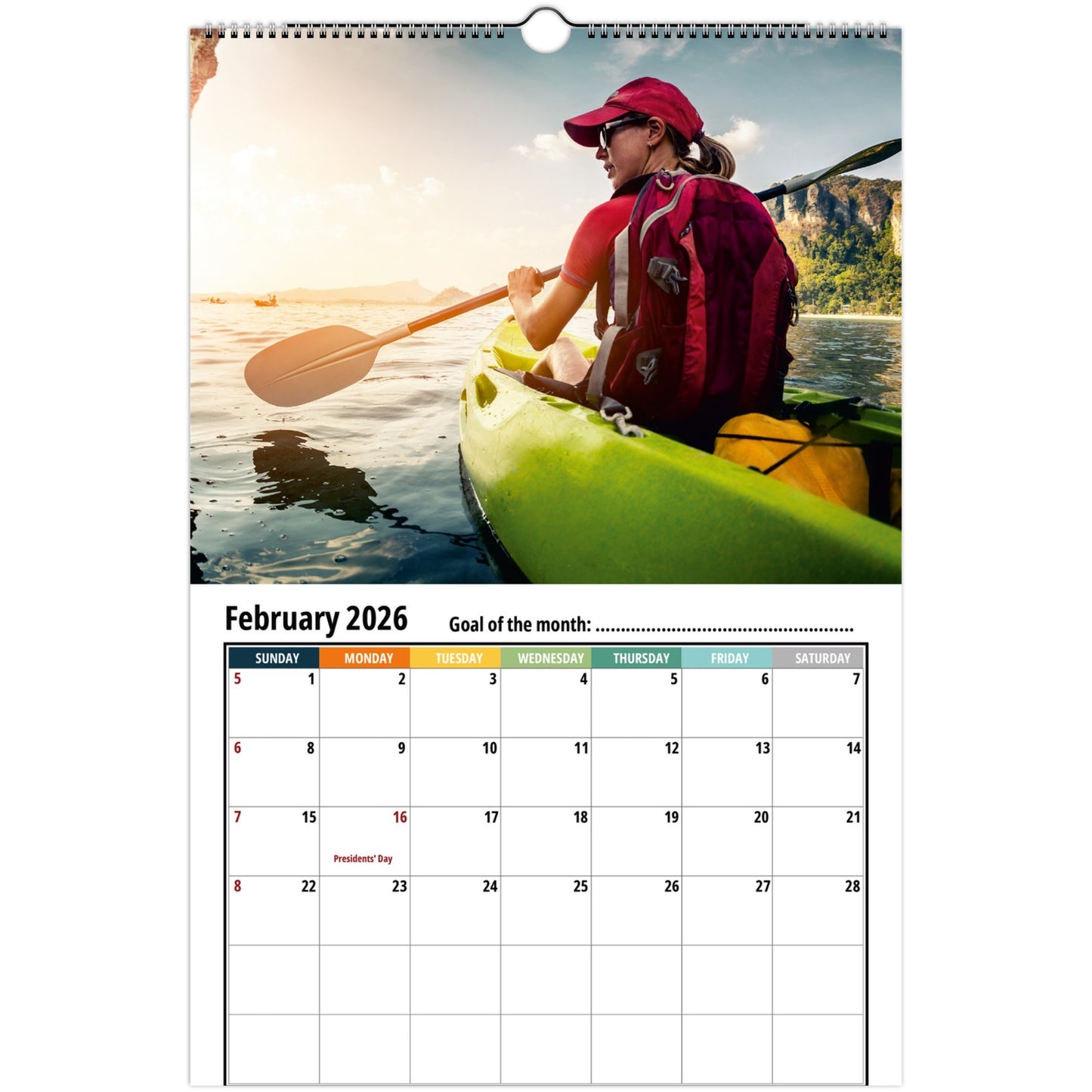 Calendar for February 2026 featuring a person kayaking on a lake.