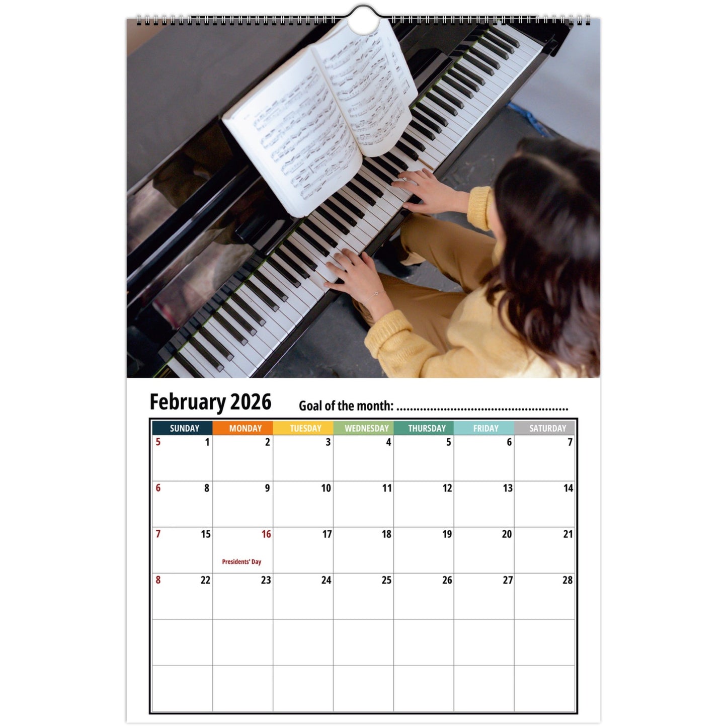 Calendar for February 2026 showing a person playing piano with sheet music.