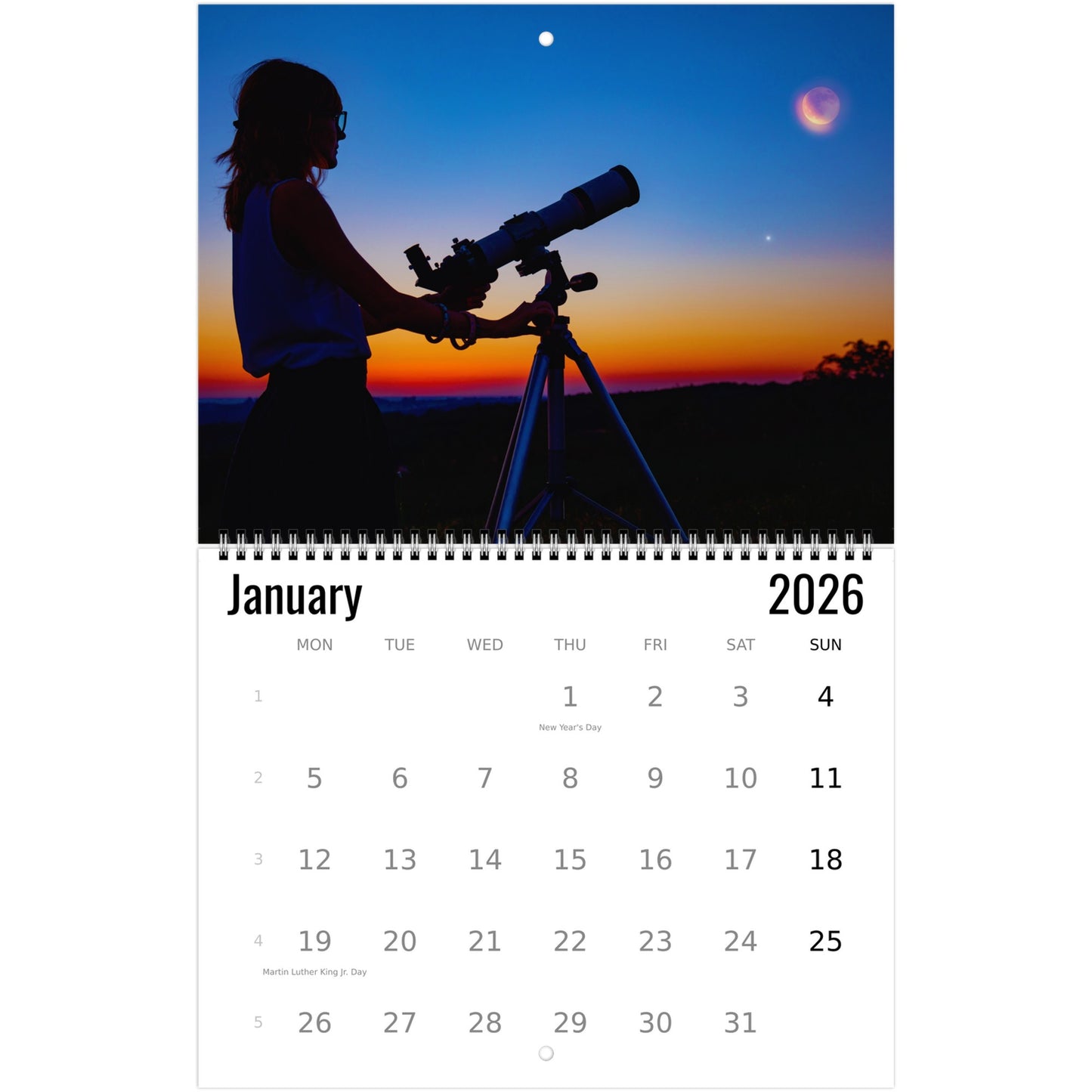 Calendar for January 2026 showing a silhouette of a person with a telescope against a sunset sky.