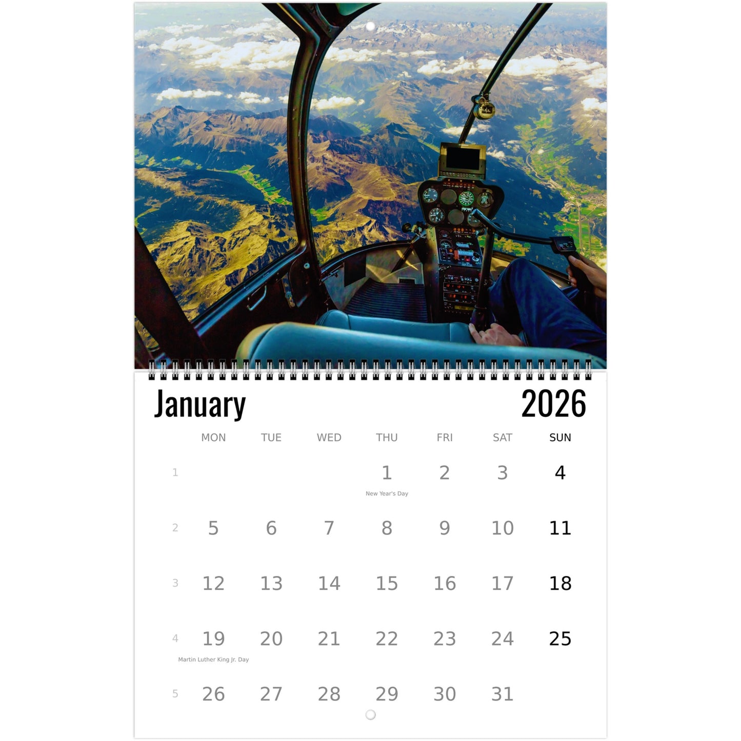 Calendar for January 2026 with a helicopter view of mountains.