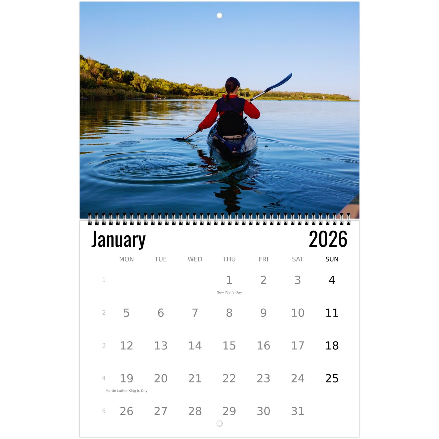 Calendar for January 2026 with a person kayaking on a lake.