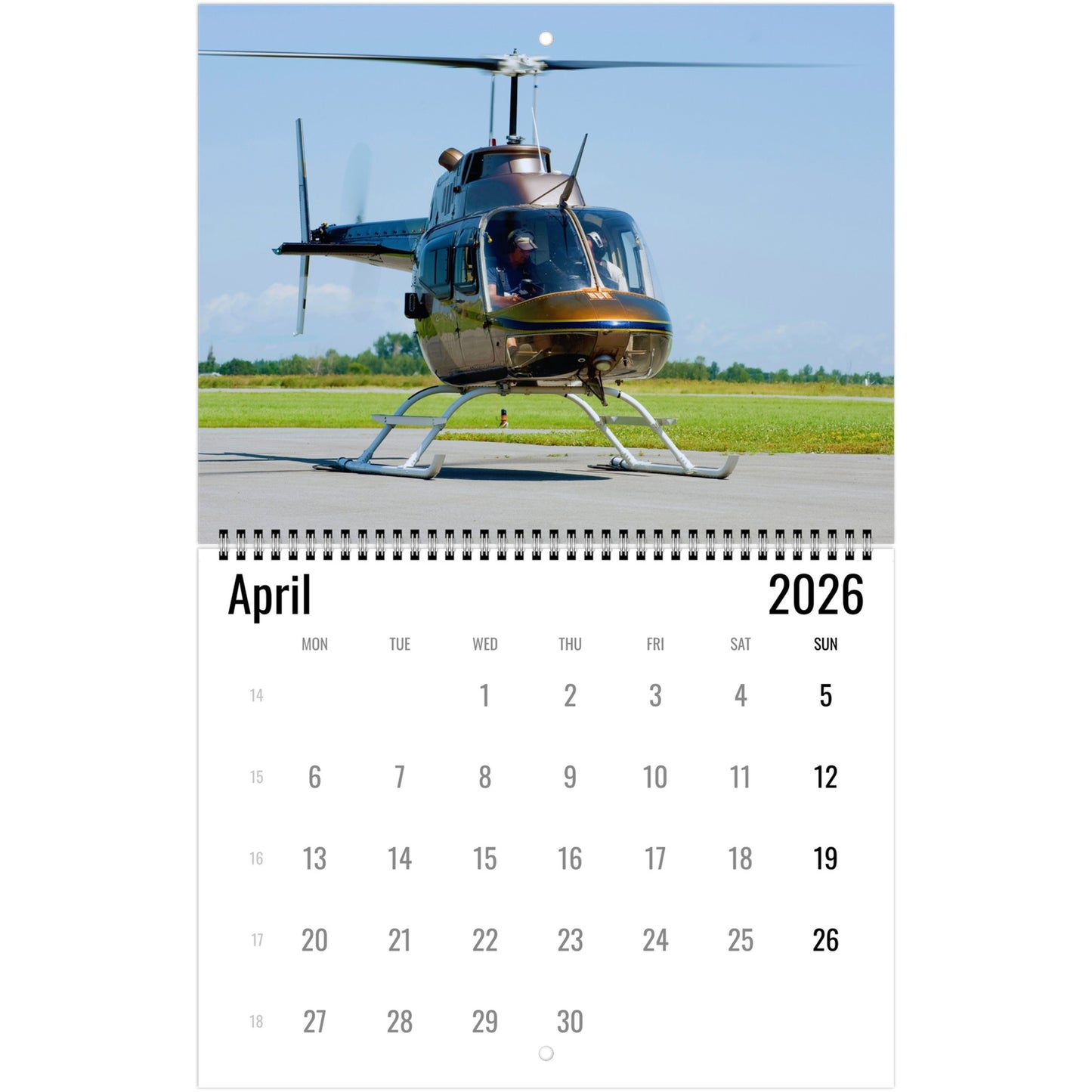 Calendar page for April 2026 with a helicopter on an airport tarmac