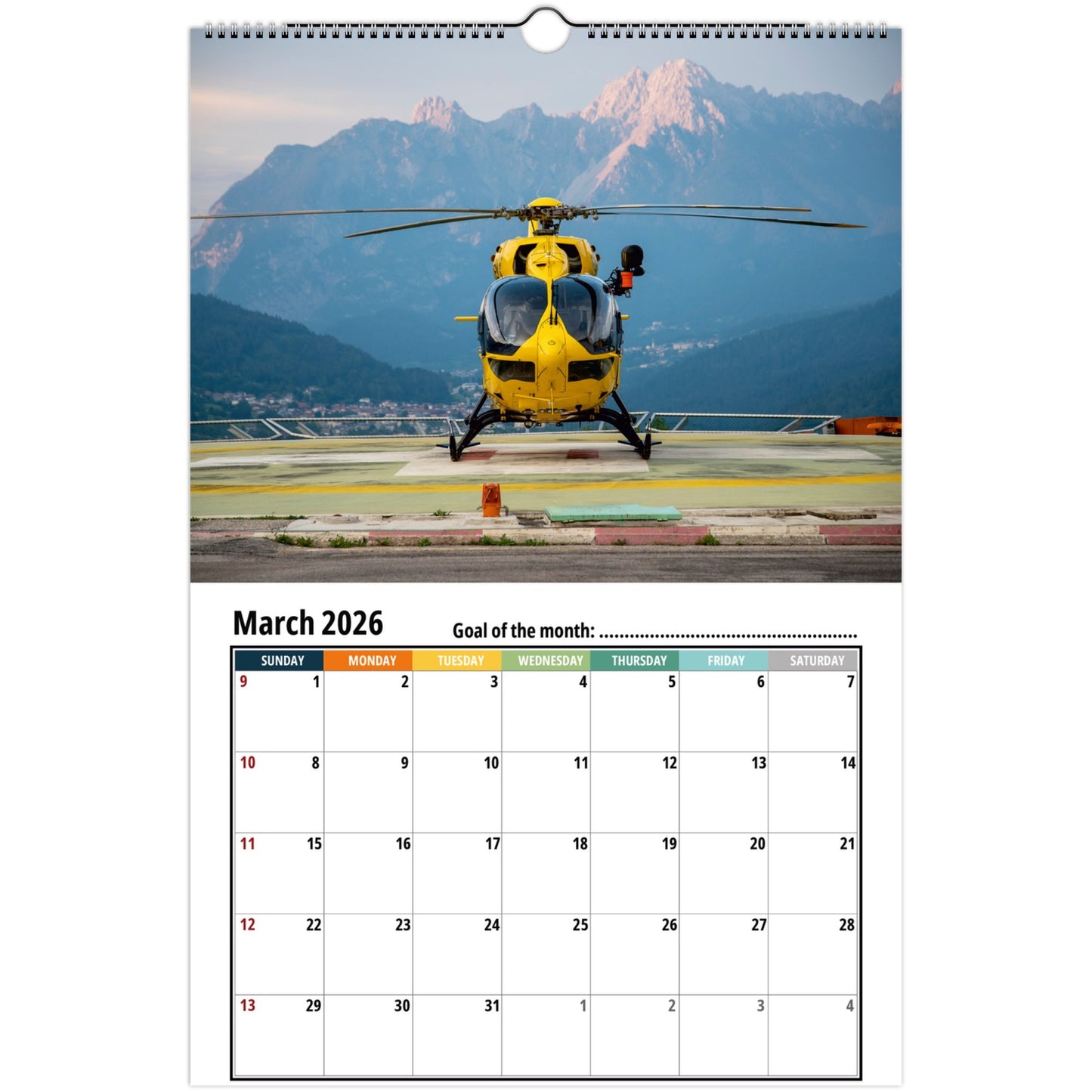 Calendar with a helicopter on an airport runway and mountains in the background