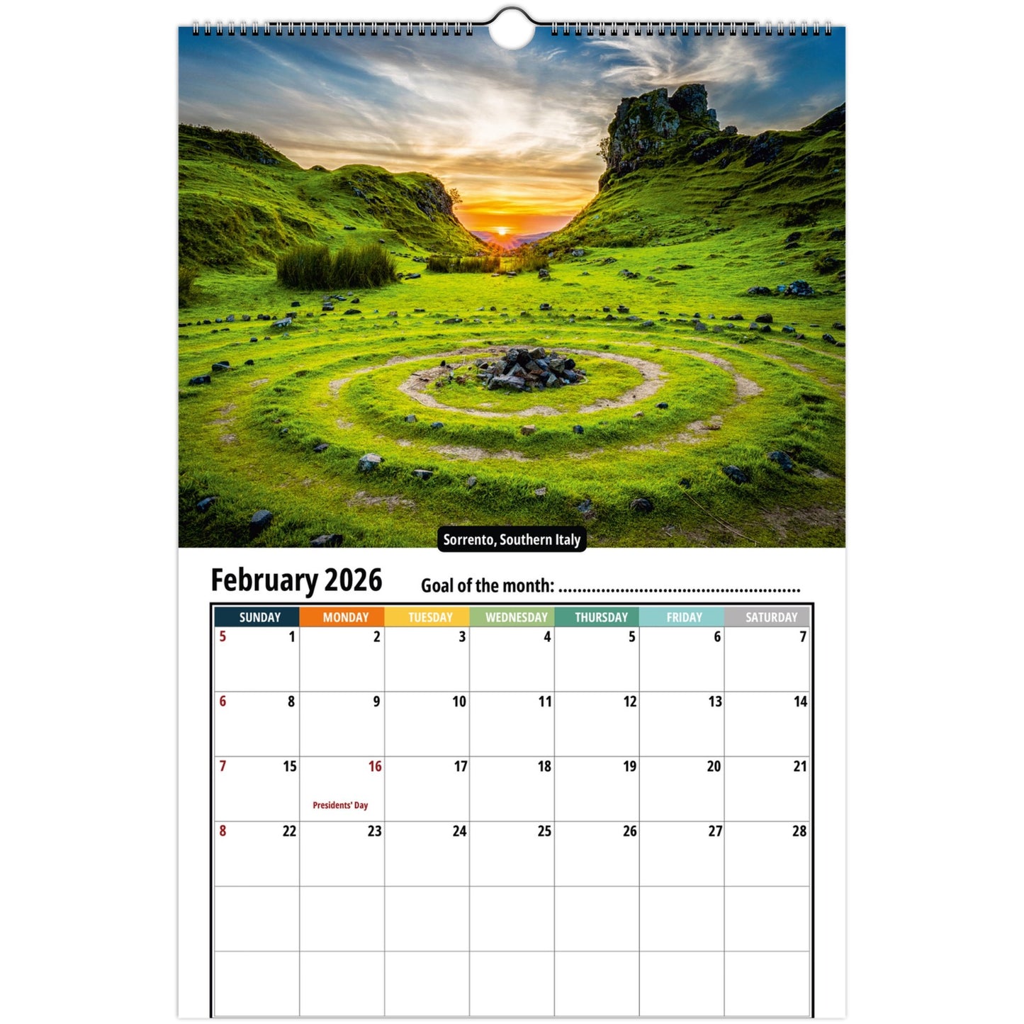 Calendar with a scenic landscape of green hills and a sunset, featuring February 2026.