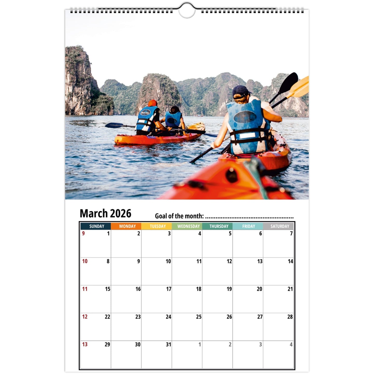 Calendar showing March 2026 with a photo of people kayaking in a scenic location.